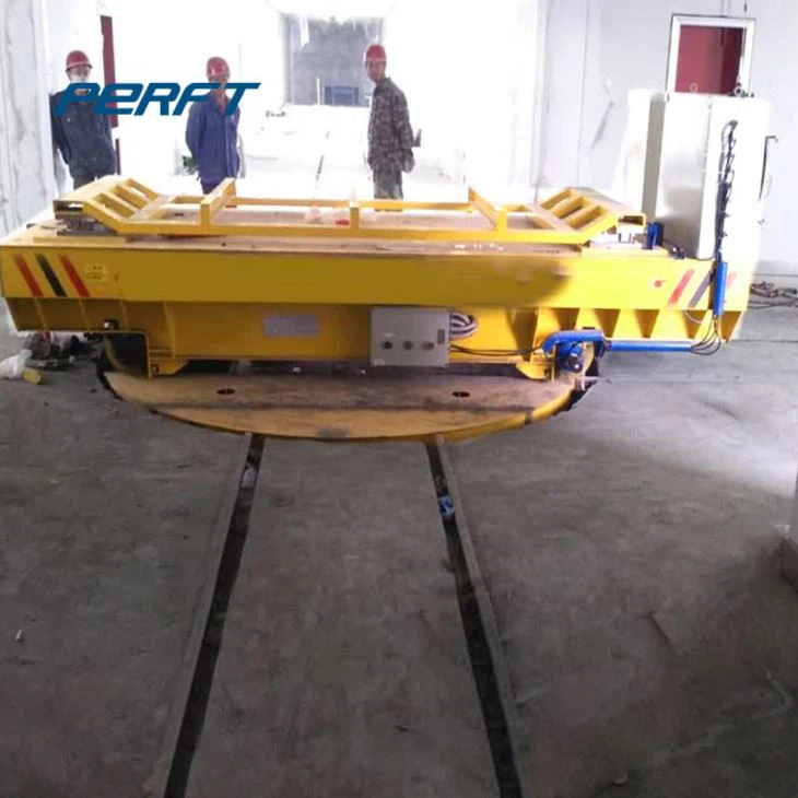 Vehicle de transferència de plataforma giratòria